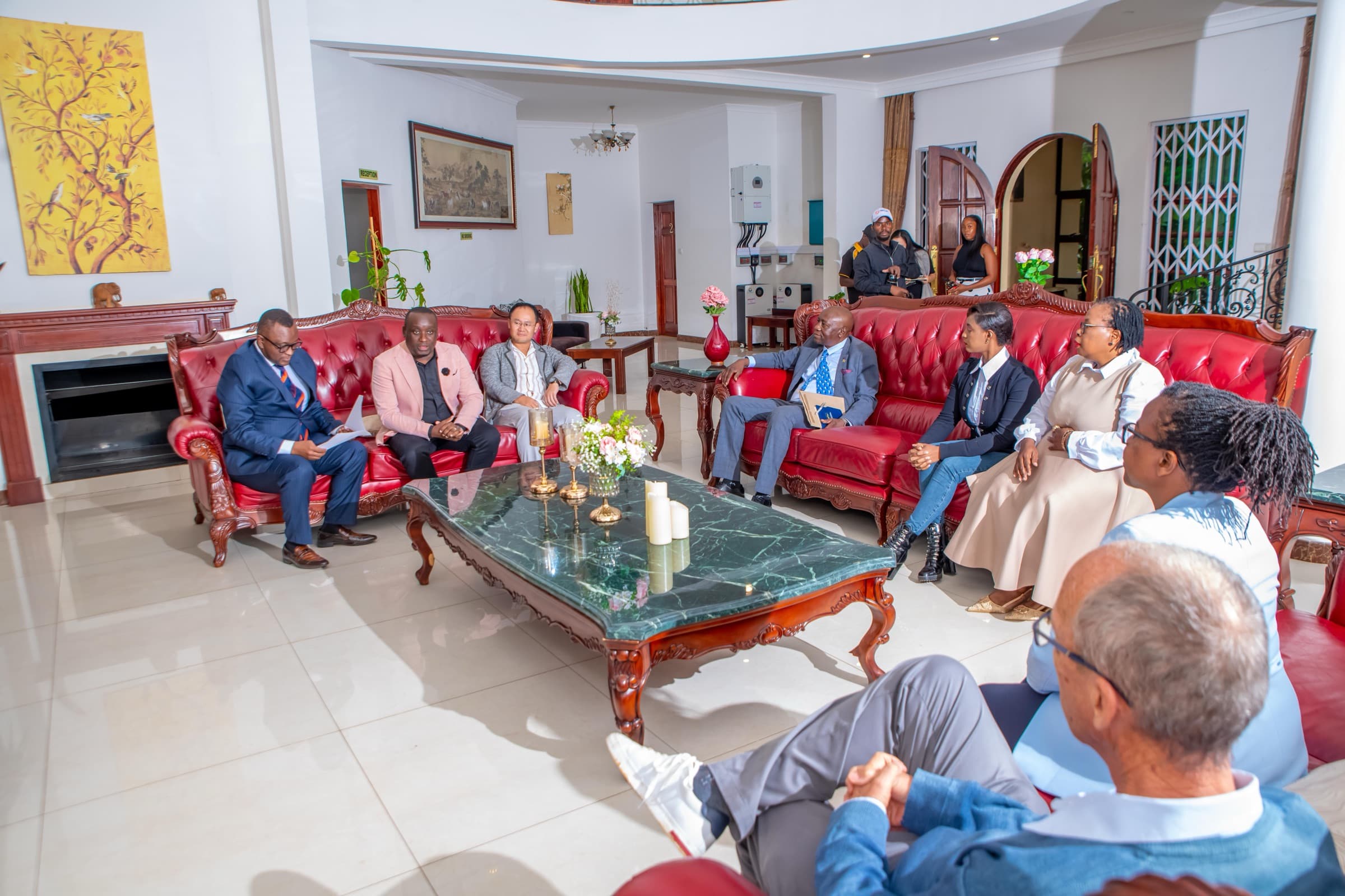 Executives in conversation in a hotel lounge